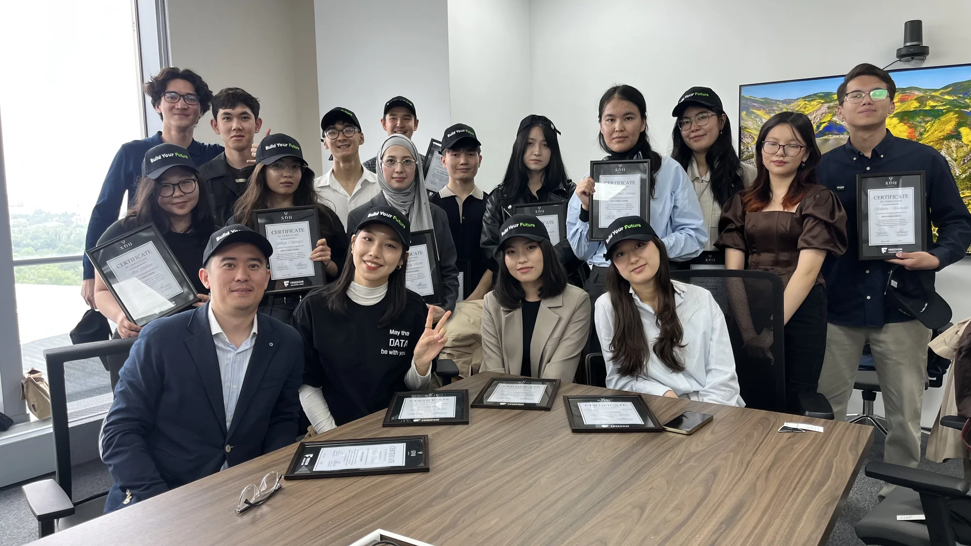 MADRID Lab members gathered with certificates at SDU University